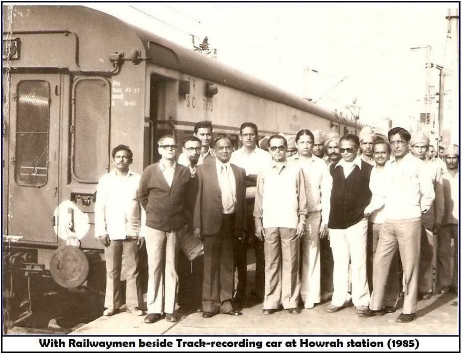 A group of men standing in front of a train AI-generated content may be incorrect.
